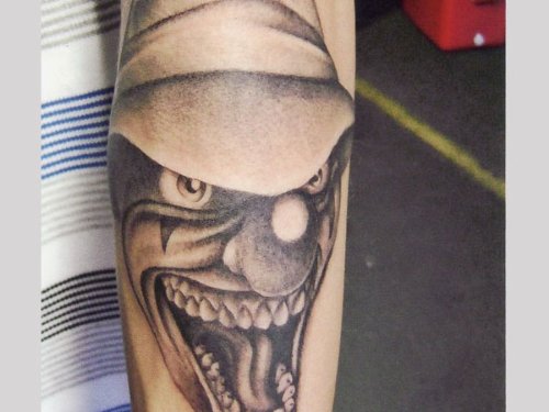 Grey Ink Clown Head Gangsta Tattoo On Sleeve