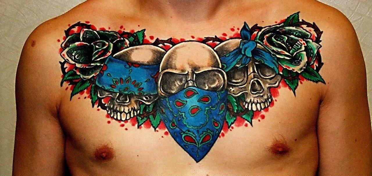 Blue Bandana and Skulls Gangsta Tattoo On Man Chest