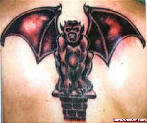 Red And Black Ink Gargoyle Tattoo