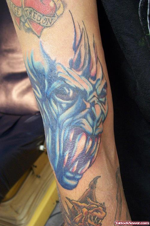 Attractive Demon Gargoyle Head Tattoo