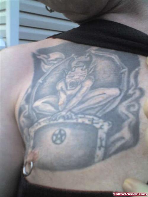 Grey Ink Gargoyle Tattoo On Chest