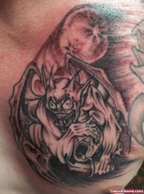 Attractive Grey Ink Gargoyle Tattoo On Man Chest