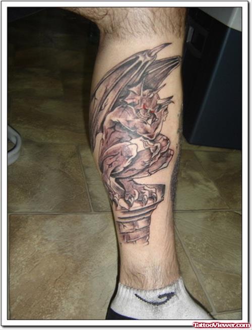 Grey Ink Gargoyle Tattoo On Left Leg