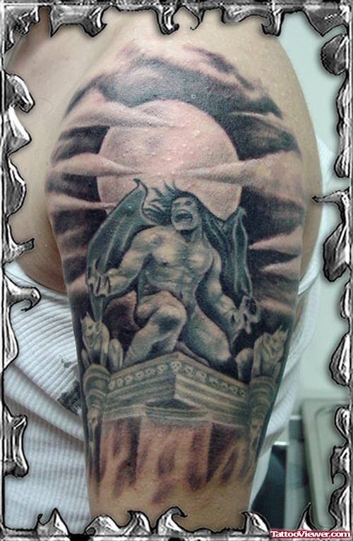 Amazing Grey Ink Gargoyle Tattoo On Left Half Sleeve