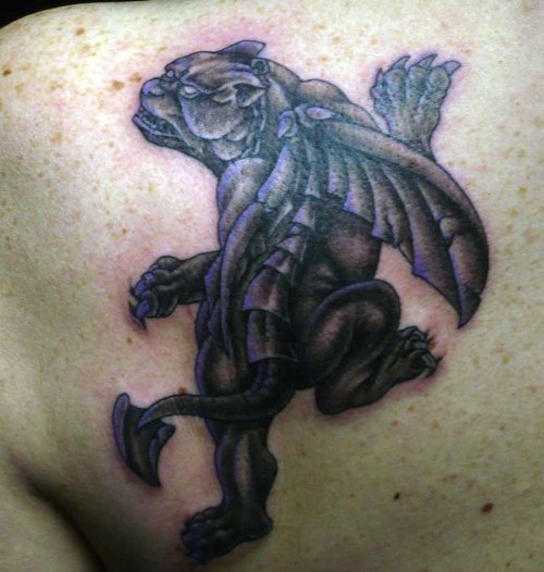 Grey Ink Gargoyle Tattoo On Left Back Shoulder