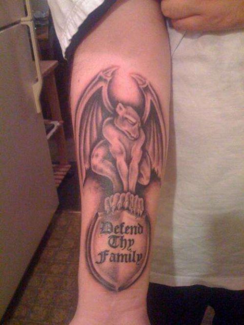 Defend The Family Gargoyle Tattoo On Arm