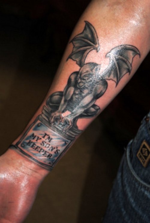Grey Ink Gargoyle Tattoo On Right Forearm
