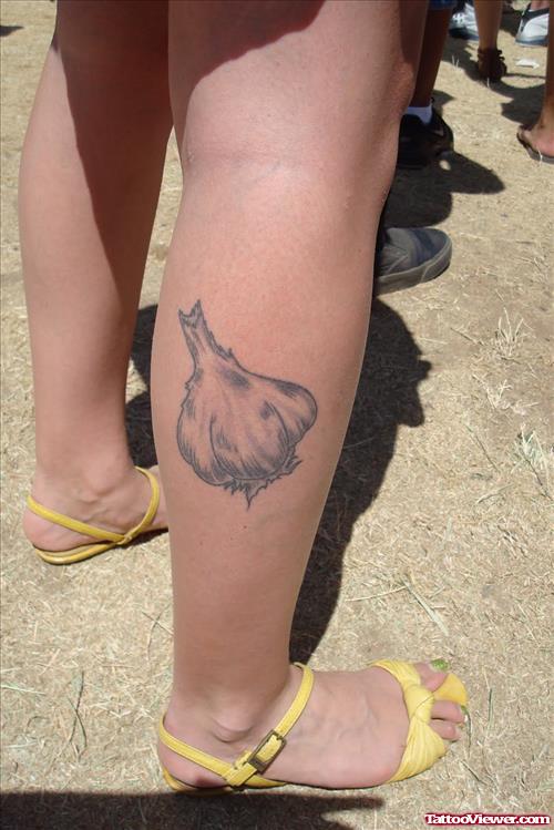 Garlic Tattoo On Girl Right leg