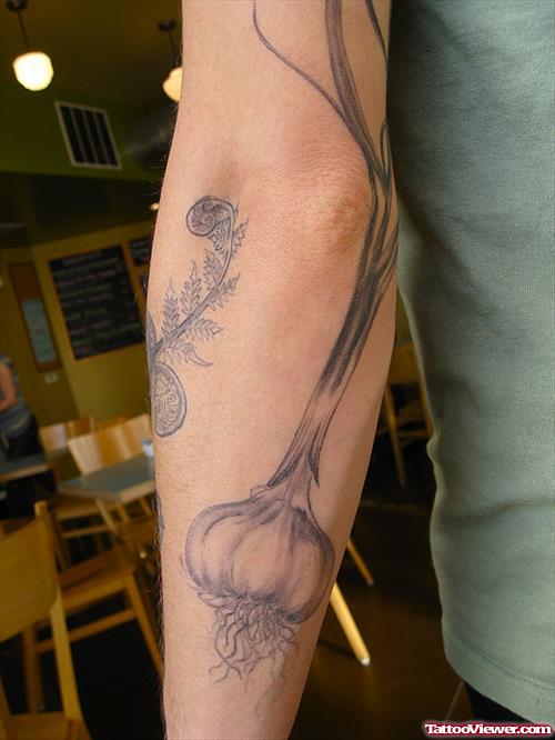Awesome Grey Ink Garlic Tattoo On Left Arm
