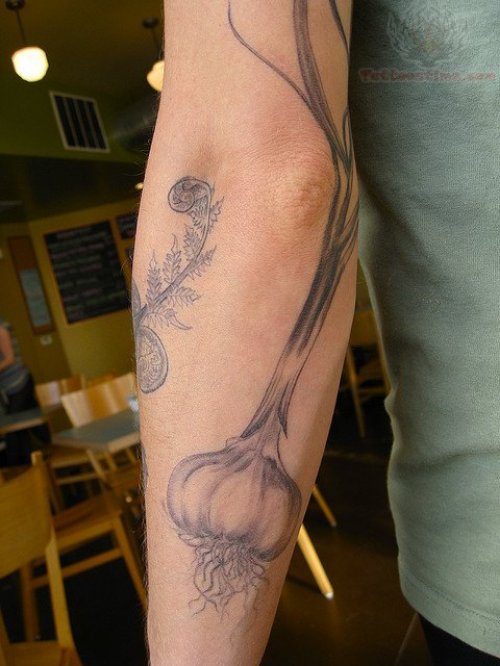 Garlic Tattoo On Elbow