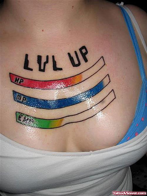 Colored Level Up Geek Tattoo On Girl Chest