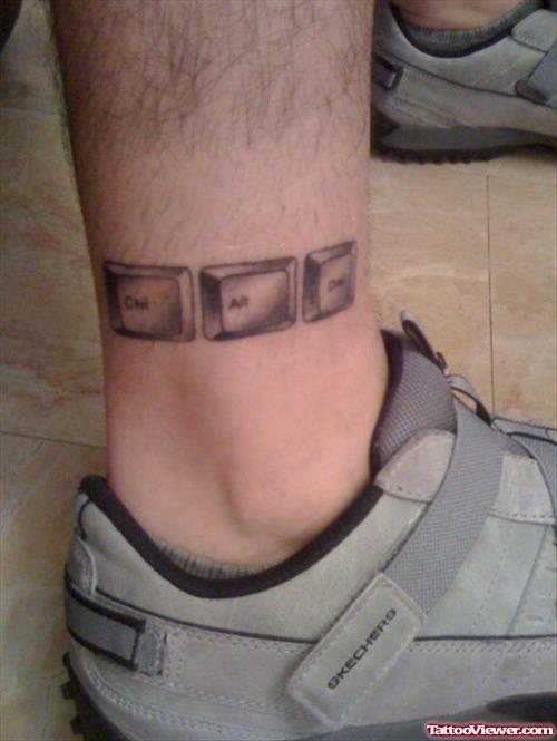 Grey Ink Geek Buttons Tattoos On Ankle