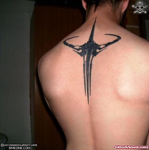 Black Ink Tribal Geek Tattoo On Back