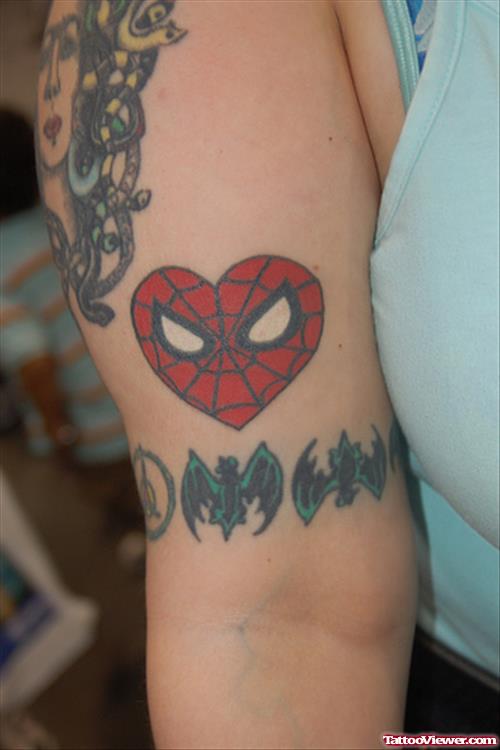 Spiderman Head Heart Geek Tattoo On Bicep
