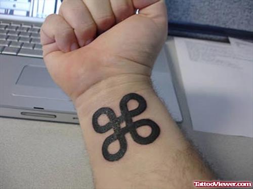 Black Ink Geek Tattoo On Right Wrist