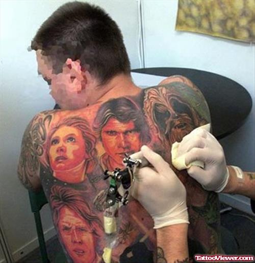 Awesome Colored Geek Tattoo On Man BAck