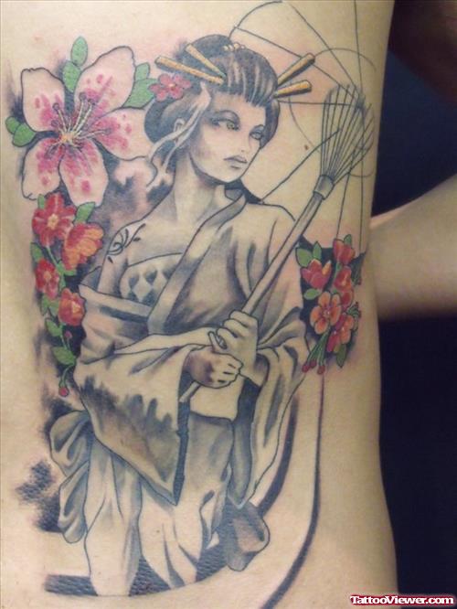 Flowers And Pin Up Geisha Tattoo On Side