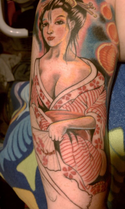 Geisha Tattoo On Upper Arm