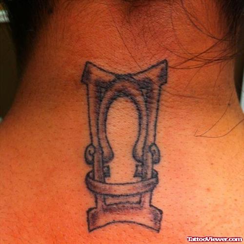Grey Ink Gemini Zodiac Tattoo On Back