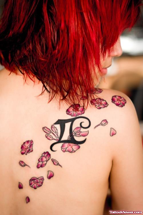 Color Flowers and Gemini Tattoo On Right BAck Shoulder