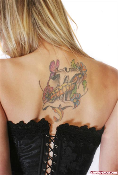 Color Flowers and Gemini Tattoo On Girl Upperback