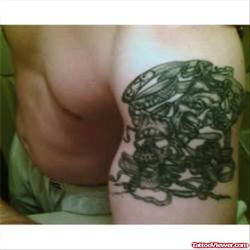 Grey Ink Gemini Tattoo On Guy Left Shoulder