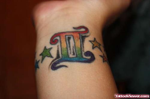 Colored Stars and Gemini Tattoo On Wrist