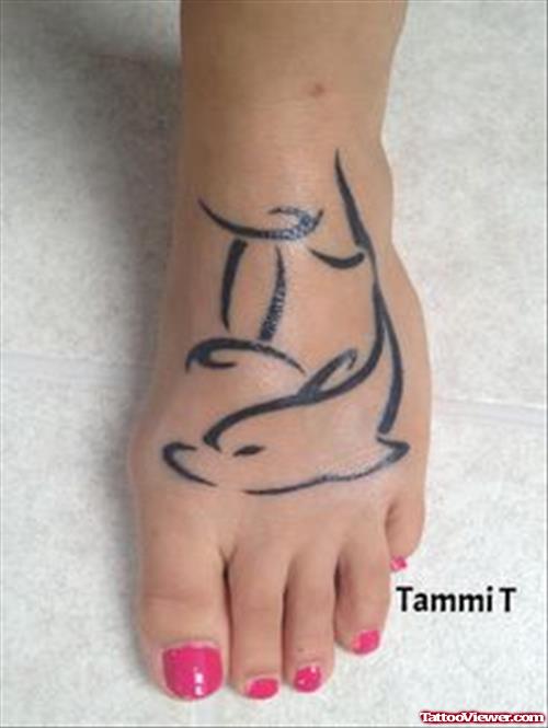 Dolphin and Gemini Tattoo On Girl Left Foot