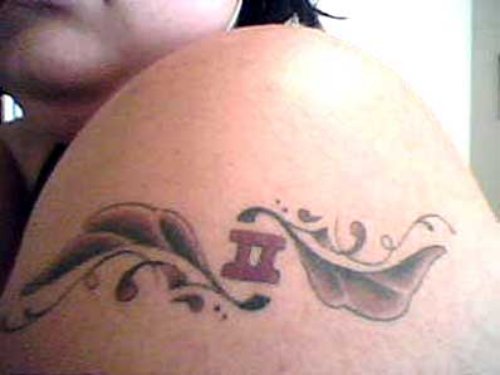 Small Zodiac Gemini Tattoo On Left Shoulder