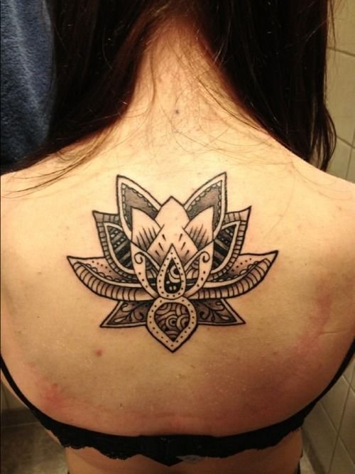 Geometric Flower Tattoo On Upperback