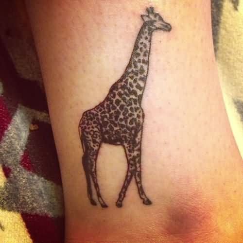 Beautiful Black Ink Giraffe Tattoo On Ankle
