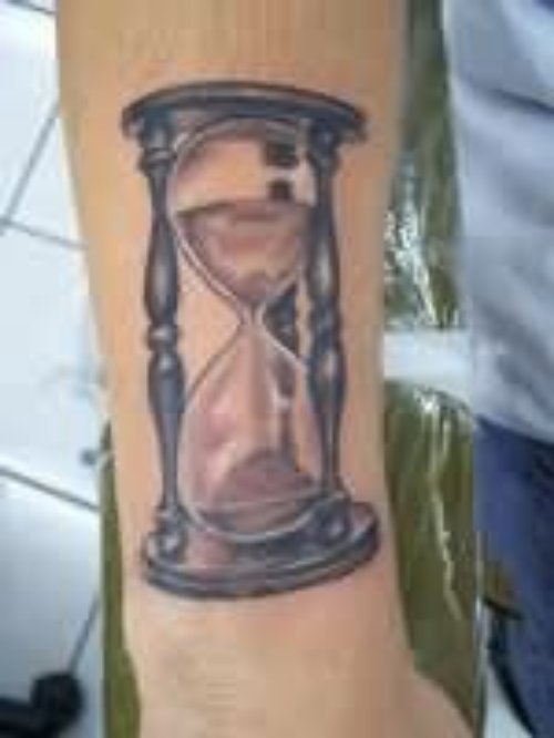 Grey Ink Hourglass Tattoo On Arm