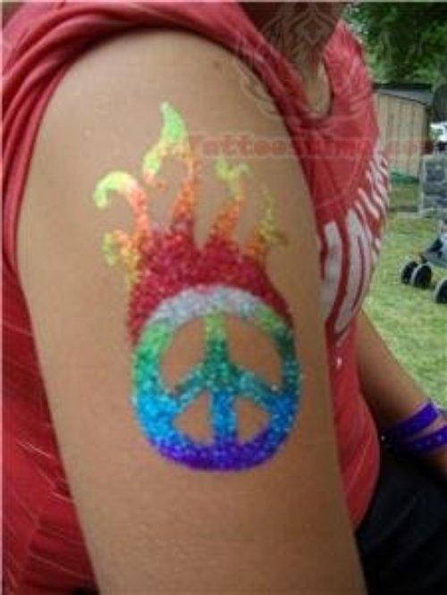 Flaming Peace Symbol Glitter Tattoo On Bicep
