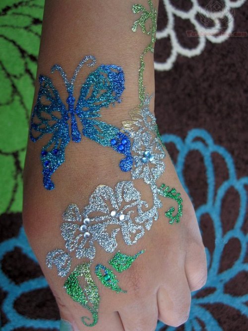 Butterfly And Flowers Glitter Tattoo On Hand