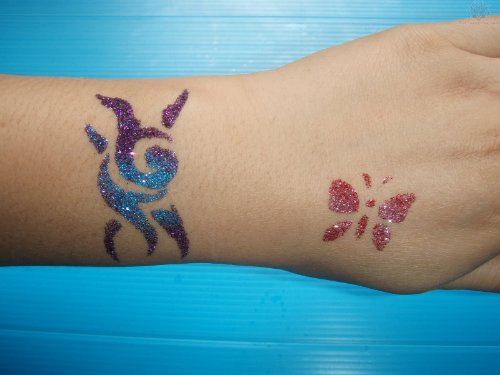 Glitter Wrist Band And Butterfly Tattoo