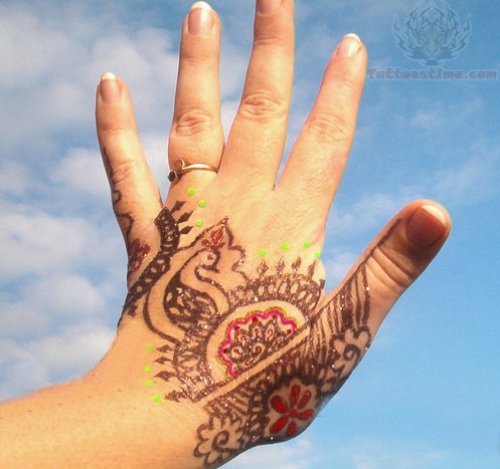 Glitter Henna Tattoo On Girl Hand