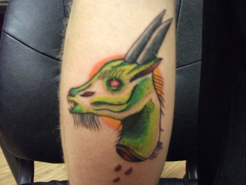 Green Ink Goat Head Tattoo