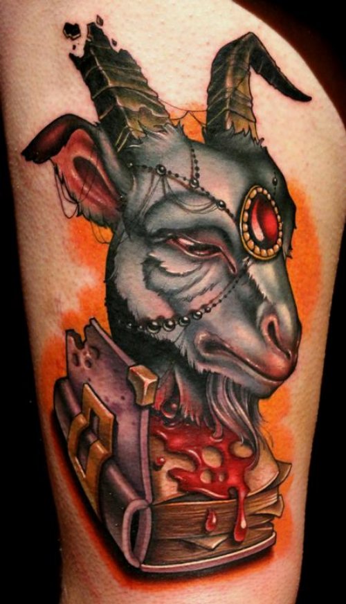 Goat Head With Bloody Book Tattoo