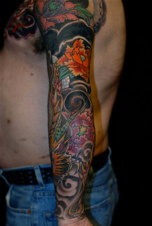 Japanese Got Dragon And Flowers Tattoo On Sleeve