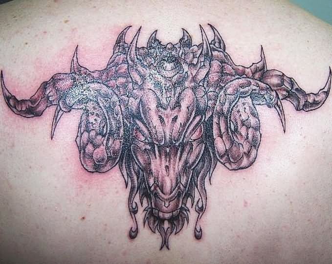 Grey Ink Back Shoulder Goat Head Tattoo