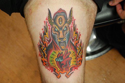 Colored Heart And Goat Skull Tattoo On Thigh