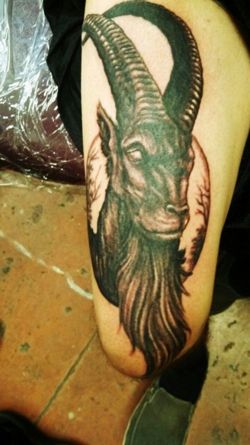 Right thigh Grey Ink Goat Tattoo