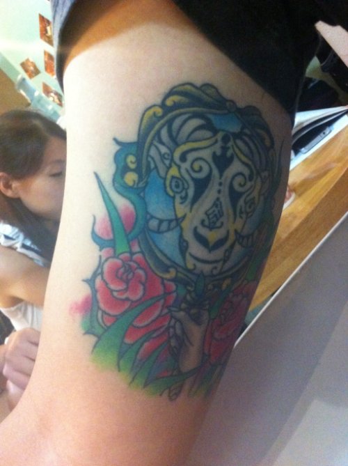 Red Rose And Goat Tattoo On Bicep