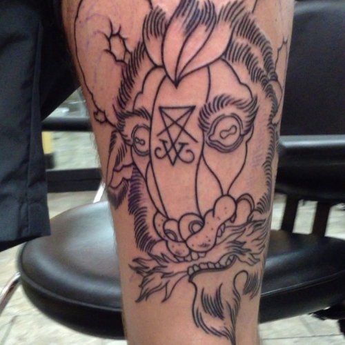 Grey Ink Goat Head Tattoo On Left leg
