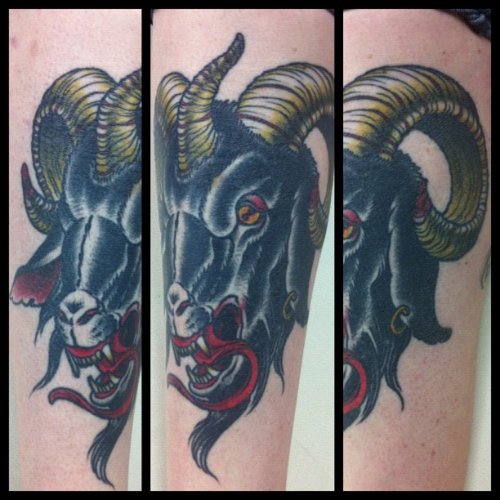 Awesome Black Ink Goat Head Tattoo