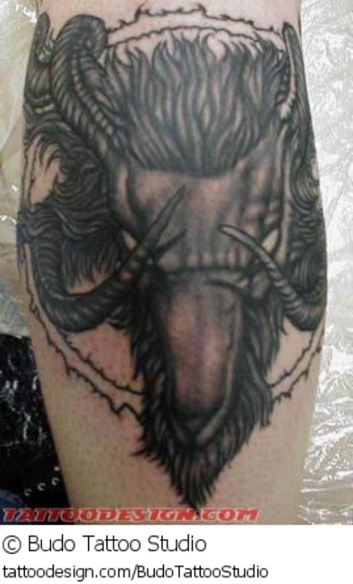 Awesome Grey Ink Goat Head Tattoo On Biceps