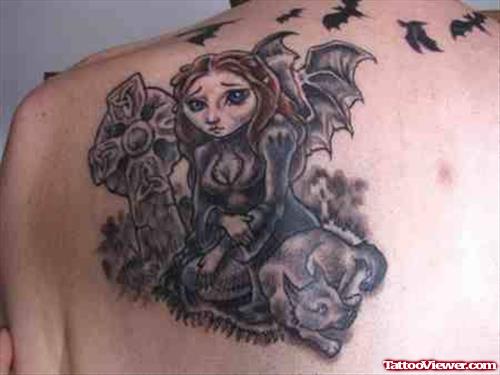 Grey Ink Gothic Tattoo On Left Back Shoulder