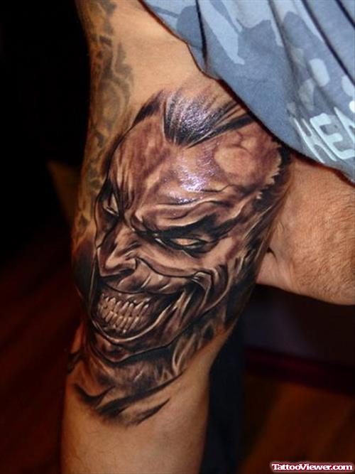 Grey Ink Gothic Head Tattoo On Right Bicep