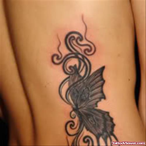 Grey Ink Gothic Butterfly Tattoo On Side Rib