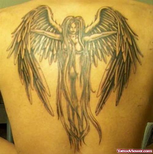 Grey Ink Gothic Angel Tattoo On Bicep